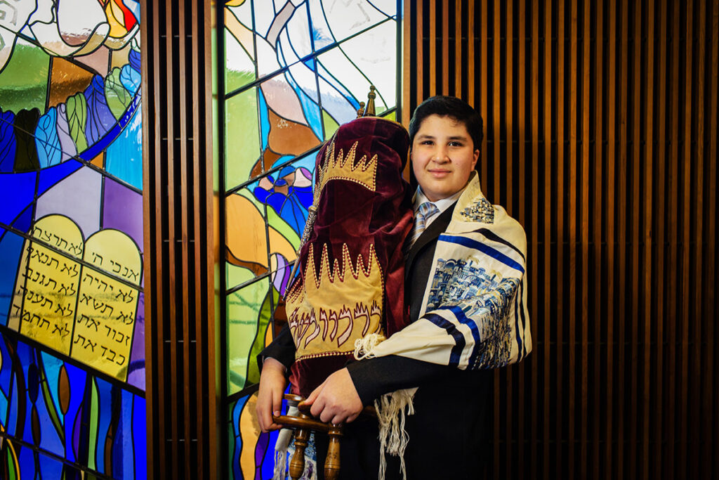 Traditional portrait taken of Bar Mitzvah celebration in San Diego Temple . Photo by Dennis Mock