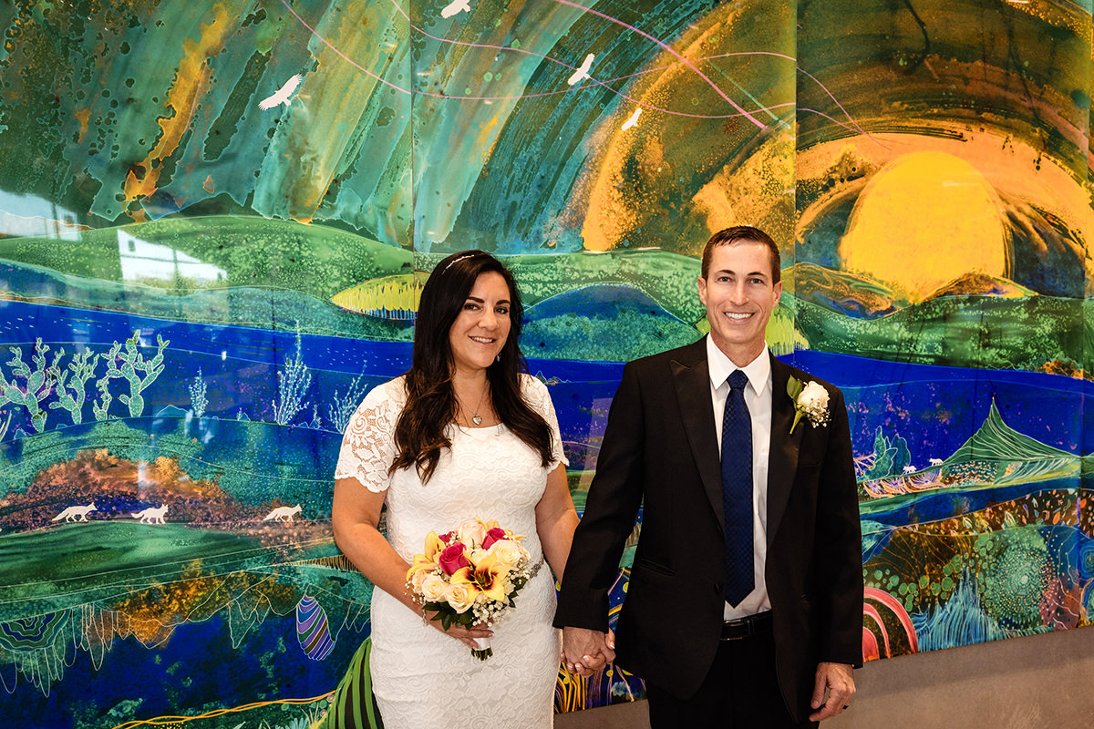 Love the colors at the Santee, Calfornia courthouse. Couple pose for a photo at their appointment time 