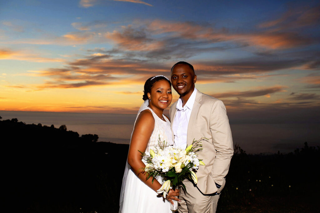 Mount Soledad wedding overlooking La Jolla. A beautiful  sunset portrait with  a fun couple that just got married